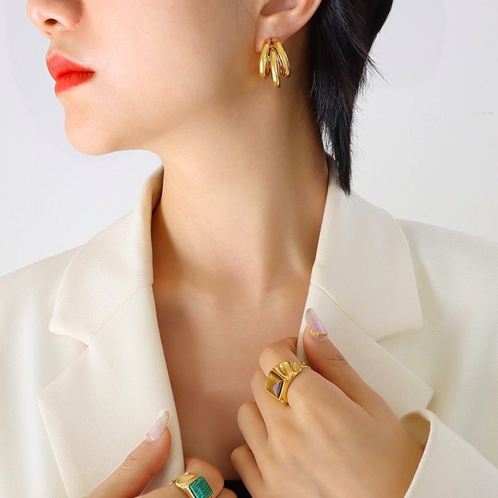Model wearing Jefa Moves earrings