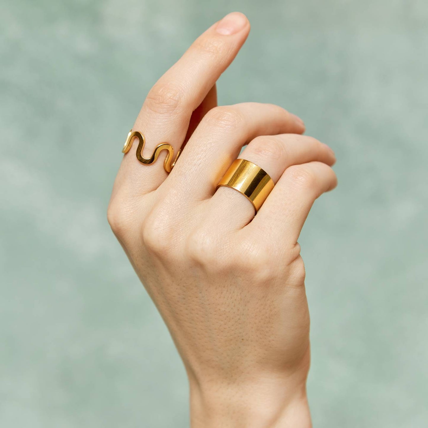Product photo of hand and Goddess Ring